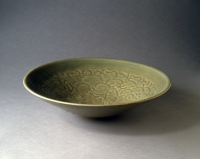 China%2C%20Shaanxi%20province%2C%20Yaozhou%20kilns%2C%20%3Cb%3E%3Ci%3E%20Yaozhou%20ware%20large%20dish%20with%20peony%20design%3C%2Fi%3E%3C%2Fb%3E%2C%20early%2012th%20century%2C%20light%20gray%20stoneware%20with%20carved%20decoration%20under%20olive-green%20celadon%20glaze%2C%20Gift%20of%20Richard%20Louis%20Brown%2C%20public%20domain%2C%201997.192